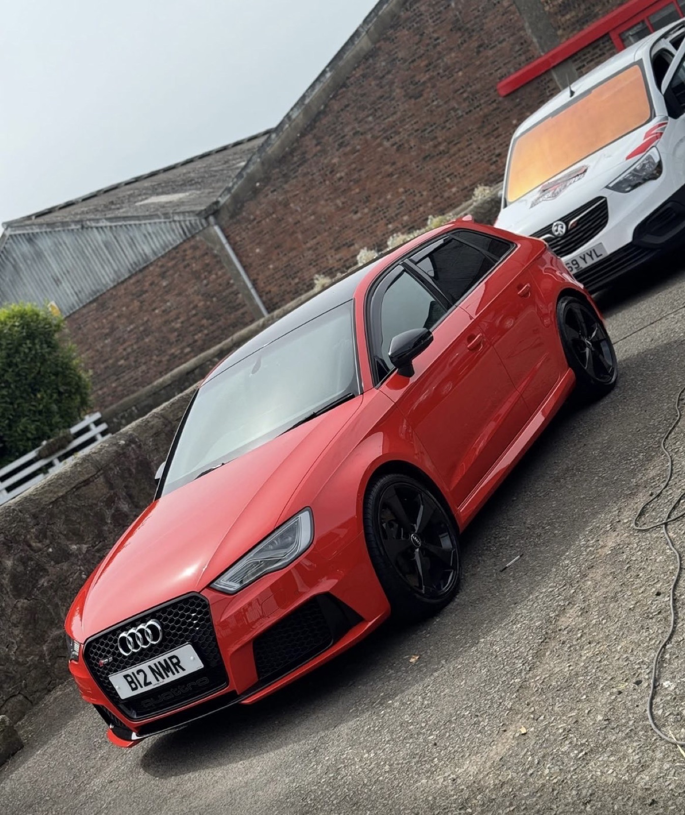 Red Audi RS3 exterior detail