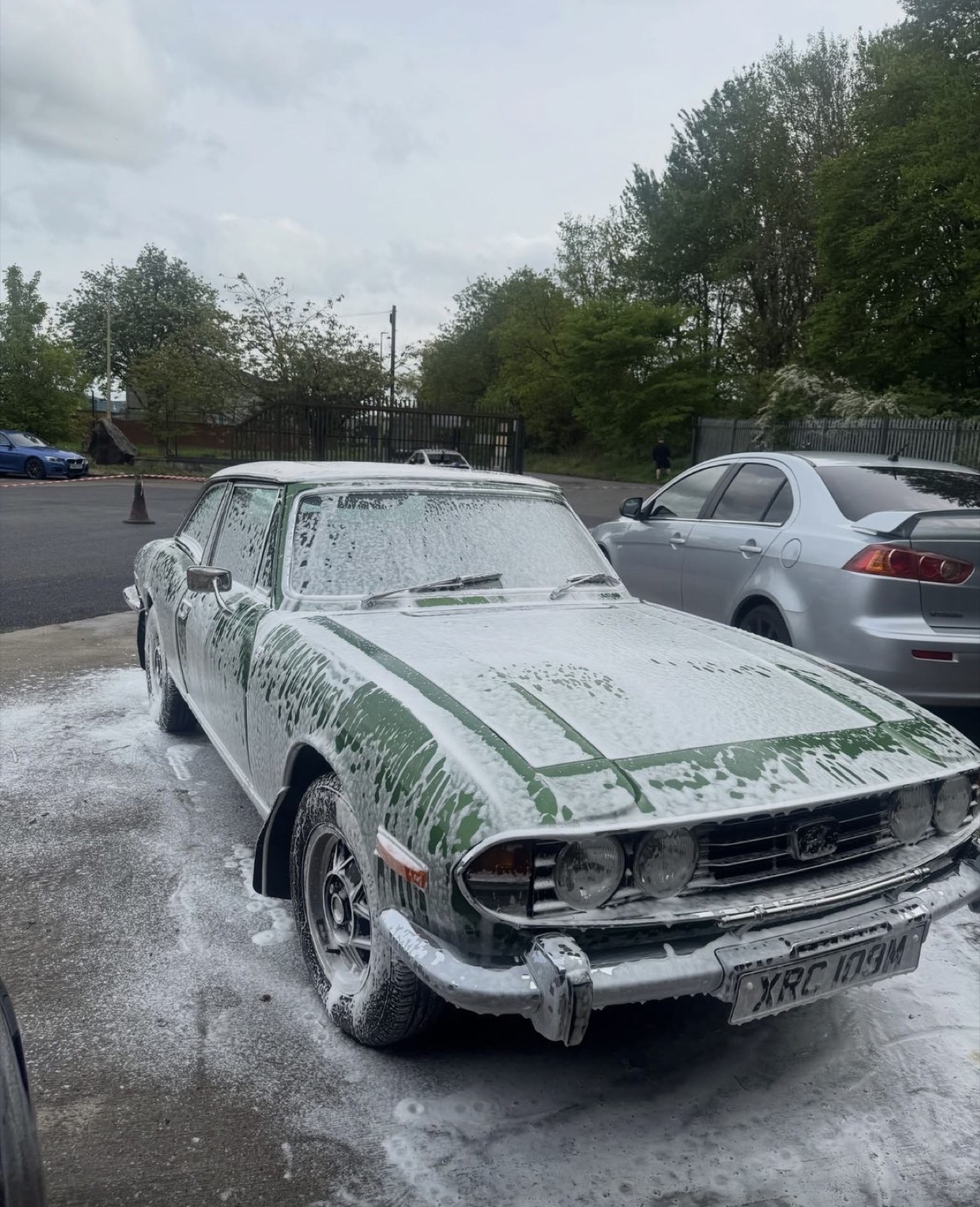 Classic Triumph Stag covered in snow foam